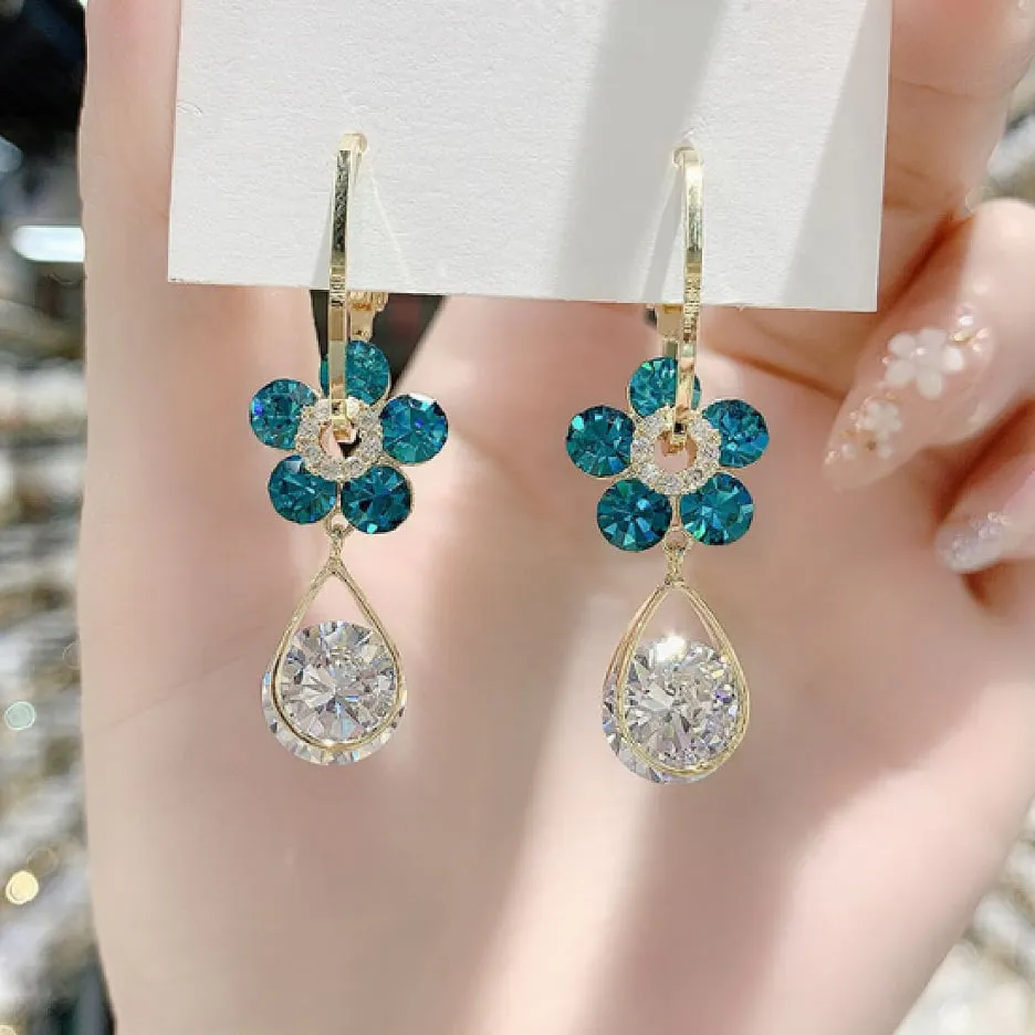 Aretes de cristal en forma de flor: Elegancia y brillo para cada ocasión - Aretes de cristal en forma de flor