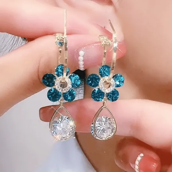 Aretes de cristal en forma de flor: Elegancia y brillo para cada ocasión - Aretes de cristal en forma de flor