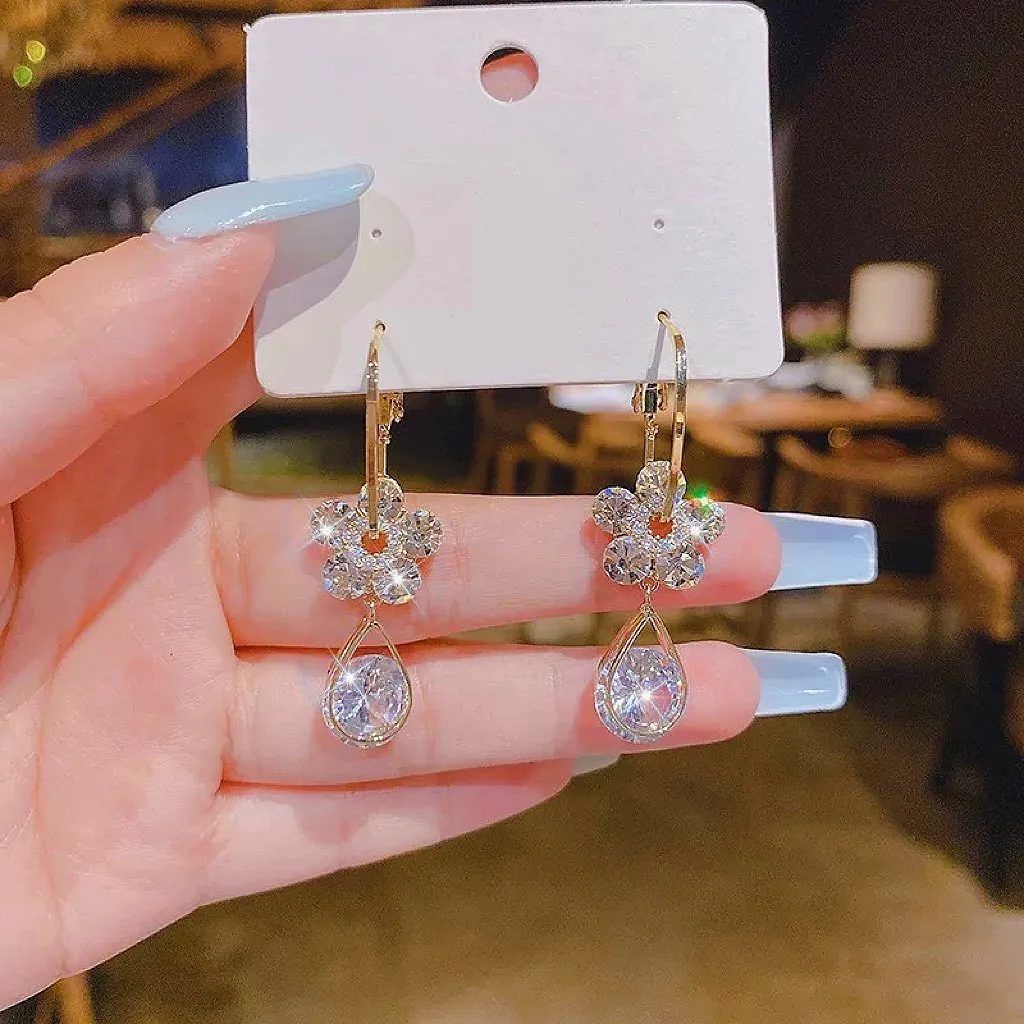 Aretes de cristal en forma de flor: Elegancia y brillo para cada ocasión - Aretes de cristal en forma de flor