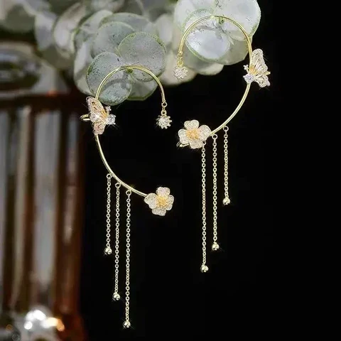 ARETES FLOR MARIPOSA: Elegancia y Belleza sin Perforaciones