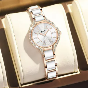 Reloj elegante de mármol blanco: Retro Light UTHAI - Reloj elegante de mármol blanco