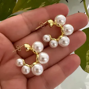 Pendientes de Perla con Detalle Dorado: Elegancia Atemporal - pendientes de perla  con detalle dorados