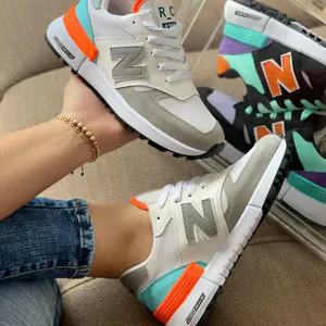 Tenis New Balance Dama Gris Naranja: Estilo y Comodidad en Cada Paso - Tenis New Balance Dama Gris Naranja