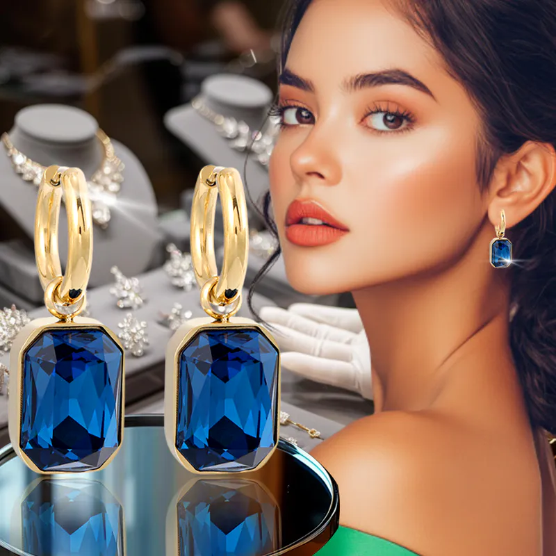 Pendientes Dorados con Cristal Azul: Elegancia y Brillo en Cada Detalle